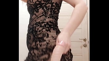 MILF In Dress Sucks Dildo And Caresses Wet Pussy In The Restroom